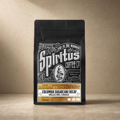 Spiritus Colombia Sugarcane Decaf 12oz coffee bag on cream stone