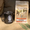 MiiR camp coffee cup beside a bag of Spiritus coffee on a burlap sack