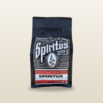Spiritus Signature Blend 12 oz bag, roasted on date written by hand, studio photo