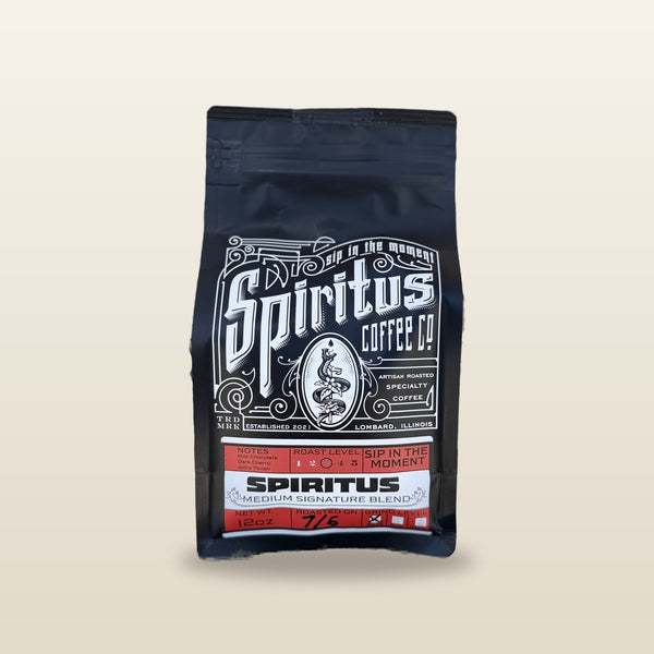 Spiritus Signature Blend 12 oz bag, roasted on date written by hand, studio photo